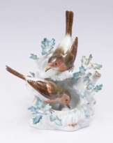 Rotkehlchengruppe mit Nest