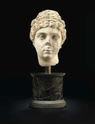 A ROMAN MARBLE PORTRAIT HEAD OF A WOMAN