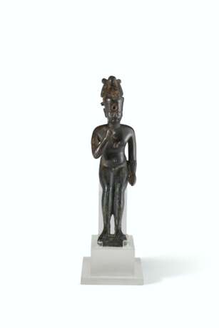 AN EGYPTIAN BRONZE HARPOCRATES WITH COPPER AND SILVER INLAYS - photo 1