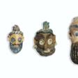 FOUR CARTHAGINIAN GLASS HEAD PENDANTS - Prix ​​des enchères