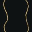 A BACTRIAN GOLD SPIRAL NECKLACE WITH DISK PENDANT - Auktionsarchiv