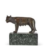 A BRONZE MODEL OF A WOLF - photo 1