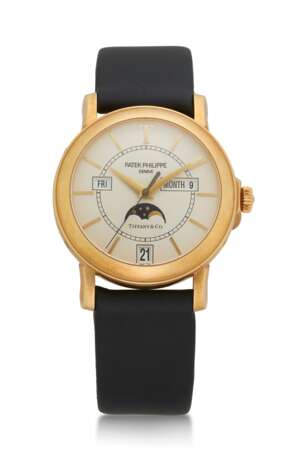 Patek Philippe. PATEK PHILIPPE, YELLOW GOLD, LIMITED EDITION OF 150 PIECES, REF. 5150J RETAILED BY TIFFANY & CO. - photo 1
