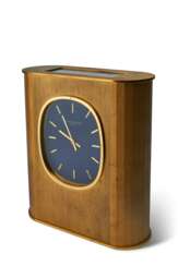 PATEK PHILIPPE, SOLAR-POWERED DESK CLOCK, GILT BRASS, “ELLIPSE D’OR”, REF. 1505E