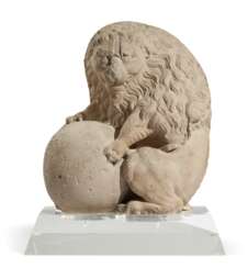 A PAIR OF LIMESTONE LIONS