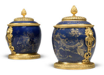 A PAIR OF FRENCH ORMOLU-MOUNTED PARCEL-GILT POWDER BLUE VASES AND COVERS 