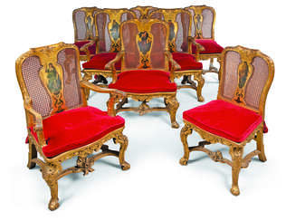 A SET OF EIGHT ITALIAN GILTWOOD, CANED AND POLYCHROME-PAINTED CHAIRS