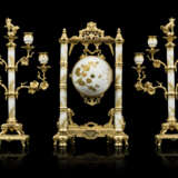 A FRENCH 'JAPONSIME' ORMOLU AND PARCEL-GILT PORCELAIN THREE-PIECE CLOCK GARNITURE - photo 2
