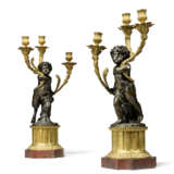 A PAIR OF FRENCH ORMOLU AND PATINATED-BRONZE THREE-LIGHT CANDELABRA - photo 1