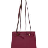 HERMÈS. A ROUGE GRENAT SWIFT LEATHER KELLY DANSE WITH GOLD HARDWARE - фото 3