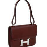 HERMÈS. A ROUGE H CALF BOX LEATHER CONSTANCE 24 WITH PALLADIUM HARDWARE - photo 2
