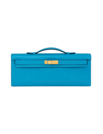 HERMÈS. A BLEU DU NORD SWIFT LEATHER KELLY CUT WITH GOLD HARDWARE - photo 1