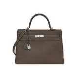 HERMÈS. AN ÉTOUPE CLÉMENCE LEATHER RETOURNÉ KELLY 35 WITH PALLADIUM HARDWARE - photo 1