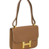 HERMÈS. A GOLD CHAMONIX LEATHER CONSTANCE 24 WITH GOLD HARDWARE - photo 2