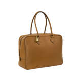 HERMÈS. A GOLD CHAMONIX LEATHER PLUME 32 WITH GOLD HARDWARE - фото 3