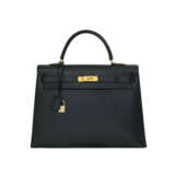 HERMÈS. A BLACK VACHE ARDENNES LEATHER SELLIER KELLY 35 WITH GOLD HARDWARE - фото 1
