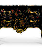 A LOUIS XV ORMOLU-MOUNTED BLACK, RED AND GILT CHINESE LACQUER BOMBE COMMODE