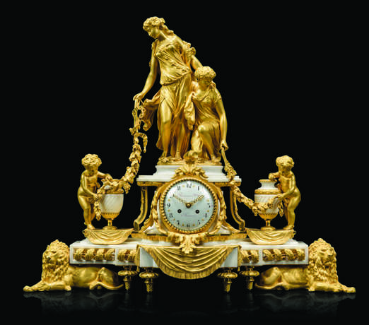 A FRENCH ORMOLU AND MARBLE THREE-PIECE CLOCK GARNITURE - Foto 2