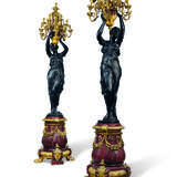 A LARGE PAIR OF ORMOLU AND PATINATED-BRONZE MOUNTED RED MARBLE THIRTEEN-LIGHT FIGURAL TORCHERES - photo 1