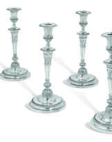 A SET OF FOUR GEORGE III SILVER CANDLESTICKS