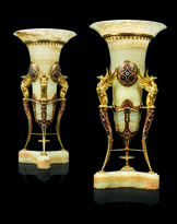 A PAIR OF FRENCH ORMOLU AND CHAMPLEVE ENAMEL-MOUNTED ONYX VASES