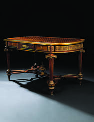 A FRENCH ORMOLU-MOUNTED AMARANTH, MAHOGANY, SYCAMORE AND BOIS SATINE PARQUETRY CENTRE TABLE