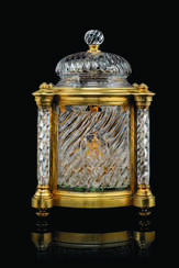 A LARGE FRENCH ORMOLU AND CUT AND MOULDED GLASS LIQUEUR CASKET