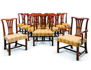 A SET OF TWELVE MAHOGANY DINING-CHAIRS