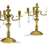 A PAIR OF FRENCH ORMOLU AND ROCK-CRYSTAL THREE-LIGHT CANDELABRA - фото 1