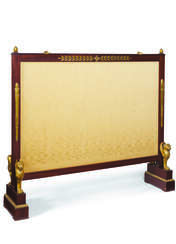 AN EMPIRE ORMOLU-MOUNTED MAHOGANY FIRESCREEN