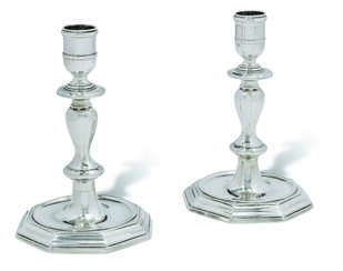 A PAIR OF GEORGE II SILVER CANDLESTICKS