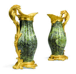 A PAIR OF FRENCH ORMOLU-MOUNTED GREEN-MARBLE EWERS