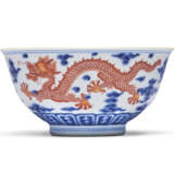 A FINE AND RARE UNDERGLAZE-BLUE AND IRON-RED DECORATED ‘DRAGON’ BOWL - фото 1