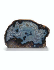 A LARGE POLISHED AGATE SLICE