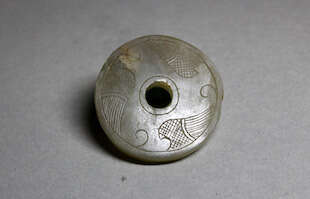 A BIRD PATTERN JADE DISC BI WARRING STATES PERIOD (476-221BC)