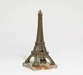 Copper Eiffel tower on marble base