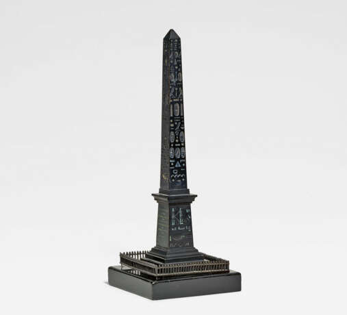 France. Small bronze Luxor obelisk at the Place de la Concorde in Paris - фото 1