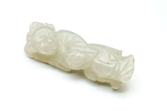 A PALE CELADON JADE FIGURE OF A BOY MING DYNASTY (1368-1644) - photo 1