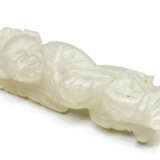 A PALE CELADON JADE FIGURE OF A BOY MING DYNASTY (1368-1644) - photo 2