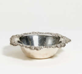 Silver bowl with clover decor
