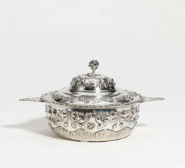 Lidded silver bowl with residues of gilt interior, festoon decor and rose shaped knob