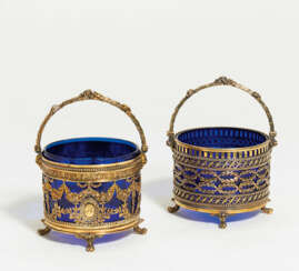 2 gilt silver cake baskets with blue glass inserts
