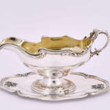 Paris. Silver gravy boat with gilt interior on fixed saucer style Rococo - photo 2