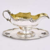 Paris. Silver gravy boat with gilt interior on fixed saucer style Rococo - photo 4