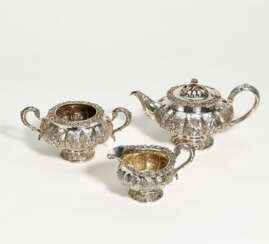 Three-piece George IV silver tea service with splendid grape and flower decoration