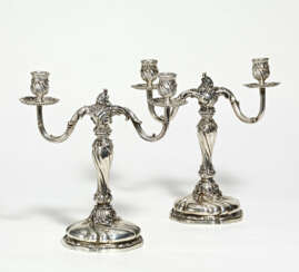 Pair of two-armed silver candlesticks style Rococo