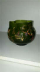 Round bulbous glass vase with fuchsias