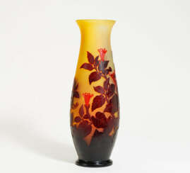 Glass vase with floral decor