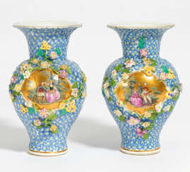 Two porcelain vases with galant couples