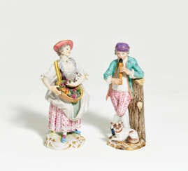 Porcelain figurines of shepherdess with flute and female gardener